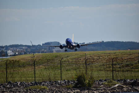 Arlington, Virginia, USA - September 29, 2021: Plane Takes Off from Ronald Reagan Washington National Airport on a Clear Dayのeditorial素材