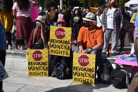 Washington, DC, USA - October 2, 2021: Women Hold Signs That Say, â€œStop Revoking...