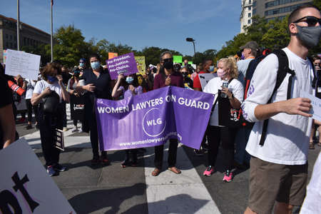 Washington, DC, USA - October 2, 2021: Women Hold a Sign for the Women Lawyers Guard at the...
