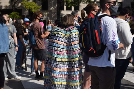Washington, DC, USA - October 2, 2021: Woman Wears a Cape Made of Condoms at the Womenâ€™s...