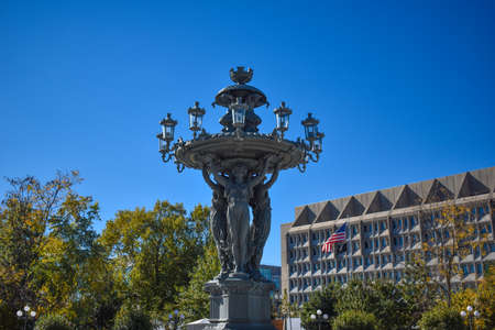 Washington, DC, USA - November 1, 2021: Close-up View of Bartholdi Fountain on a Bright, Sunny Fall Morning, and a View of the U.S. Department of Health and Human Services in the Backgroundのeditorial素材