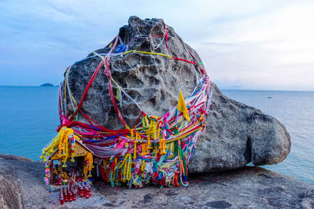 Decorated rock on the beach of Khao Kao Seng in Songkhla, Thailand, Asiaの写真素材