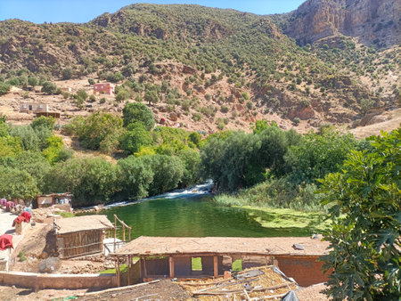 Small river is flowing through the atlas mountains in morocco creating a natural poolの写真素材