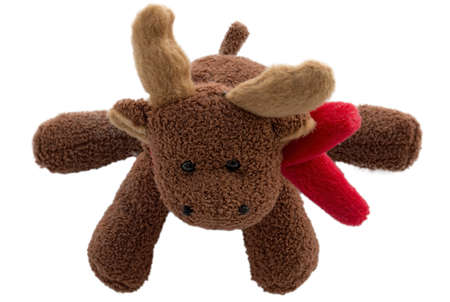 Cute scarf with red deer - christmas toy sits in the snow isolated white backgroundの写真素材