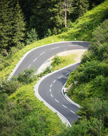 winding road at the silvretta-lake in austria - nice backgroundの写真素材