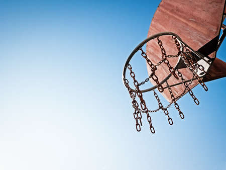 basketball hoop in front of blue skyの写真素材
