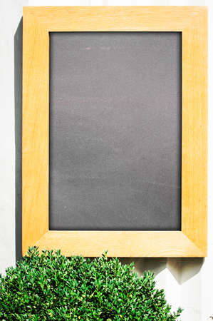 empty black board (menu board) at a restaurant - nice backgroud with space for text
