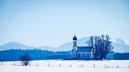 typical bavarian church near the european alpsの写真素材