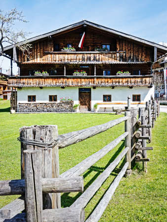 typical old farmhouse at the european alpsの写真素材