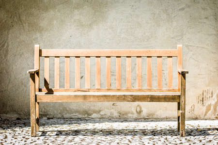 wooden park bench at a parkの写真素材