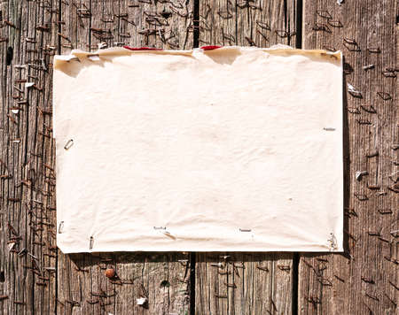 old note at a fenceの写真素材