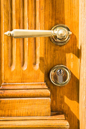 old doorknob at a frontdoorの写真素材