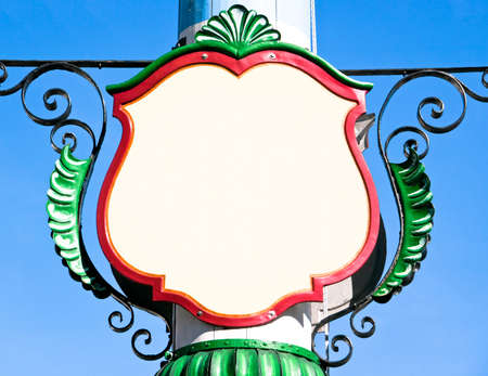 typical historic blank sign at a maypole - nice backgroundの写真素材