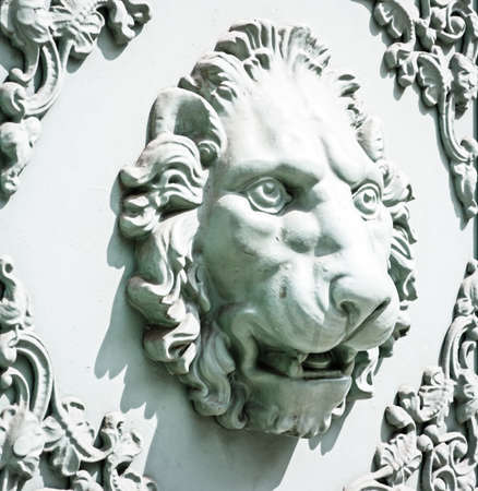 closeup of an old lion statue