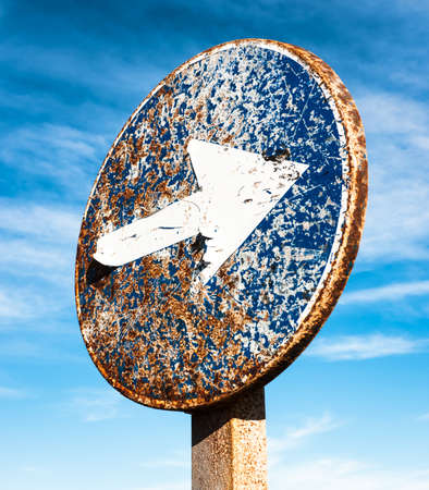 arrow road sign - close upの写真素材