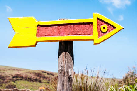 beautiful wooden arrow sign at a parkの写真素材