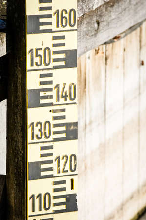 water level indicators at a river near hamburgの写真素材
