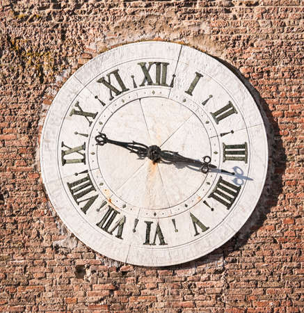 old clock at a churchの写真素材