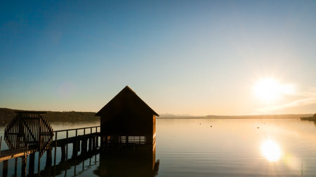 old wooden hut at a lakeのeditorial素材