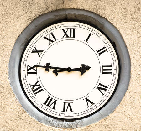 antique clock at a historic buildingの写真素材