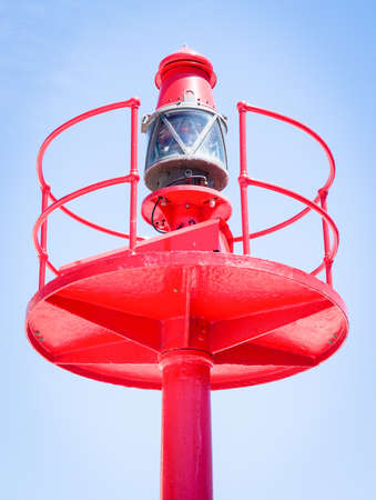 white beacon at a harborの写真素材