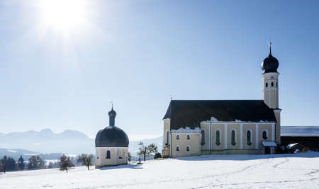 small bavarian chapel and church near rosenheimの写真素材