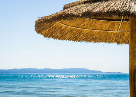 beach umbrella in italy - photoの写真素材