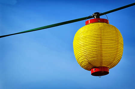 lantern in front of blue sky - space for textの写真素材