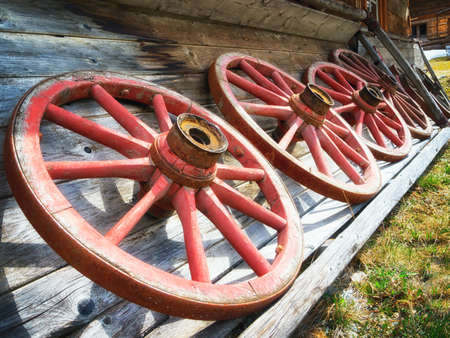 old wagon wheels at a farmの写真素材