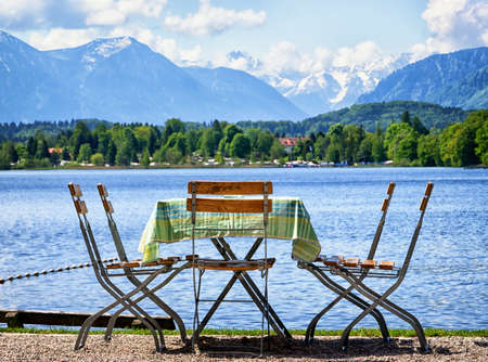 table and chairs at a cafeの写真素材