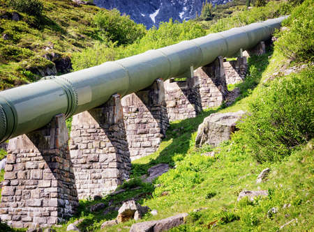 modern pipeline at a valleyの写真素材