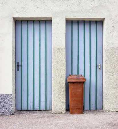 modern garbage bin at a sidewalkの写真素材