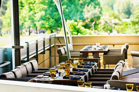 tables and chairs at a gourmet restaurant