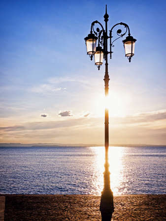 old streetlamp at a promenadeの写真素材