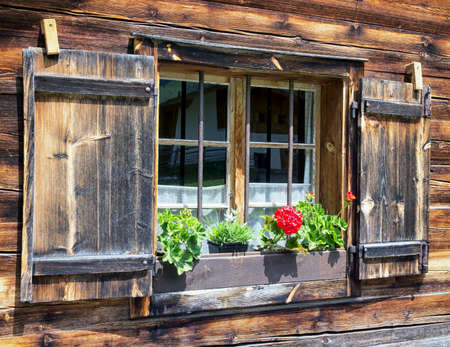 window of a typical old austrian farmhouseの写真素材