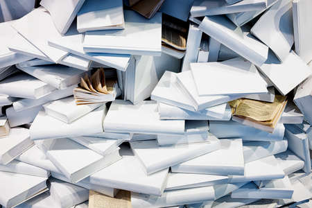 heap of blank books - chaosの写真素材