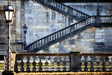 stairs and an old street-lamp at a historic buildingの写真素材