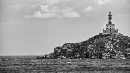 old lighthouse at an island near sardinia/italyの写真素材
