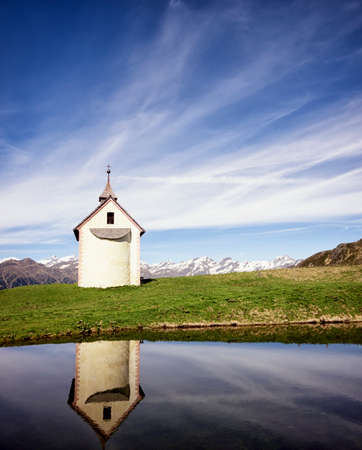 old historic chapel at the european alpsの写真素材