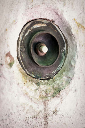 old dirty bell button at a wallの写真素材