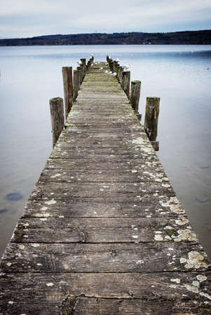 old wooden jetty at a lake