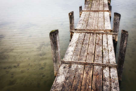 old wooden jetty at a lake