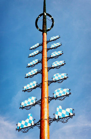 bavarian maypole in front of blue skyのeditorial素材