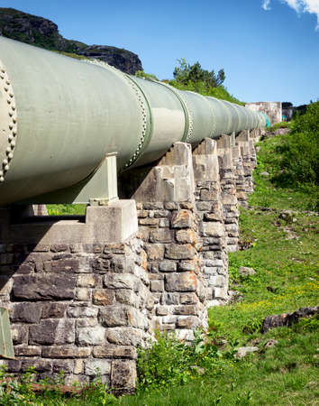 modern pipeline at a valleyの写真素材