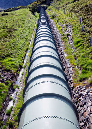 modern pipeline at a valleyの写真素材