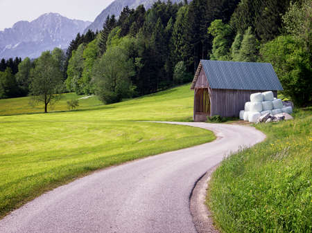 country road at the european alpsの写真素材