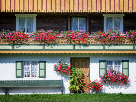typical old farmhouse at the european alpsの写真素材