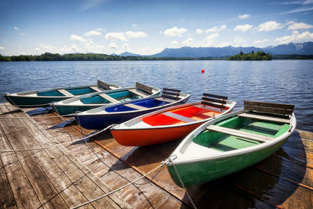 row boats at a lakeの写真素材