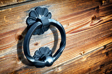 old doorknocker at a historic front door