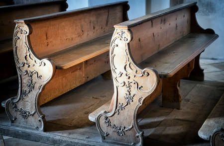 old ornate church benchesの写真素材